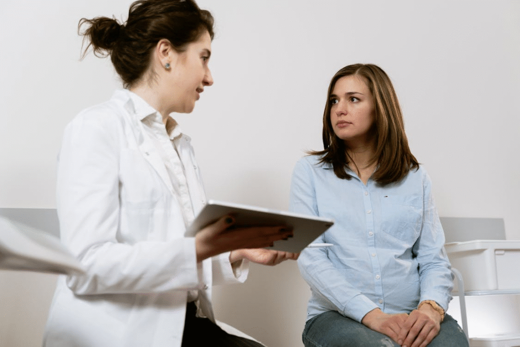 Primary care doctor consulting a patient after listening attentively