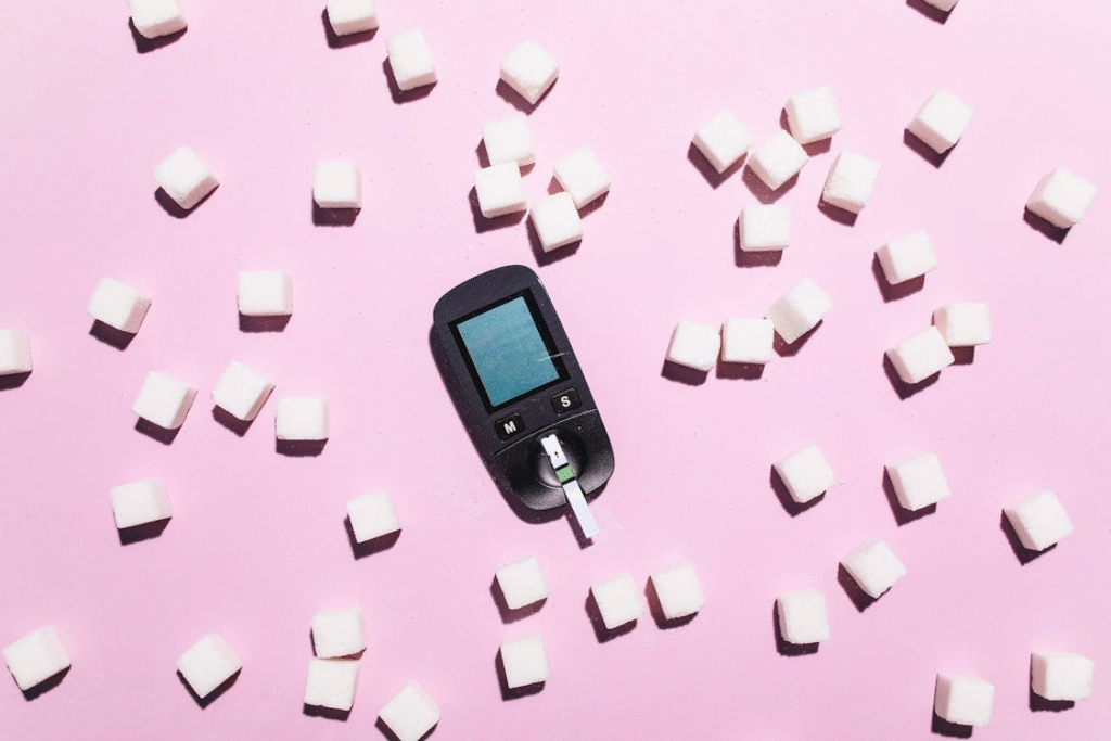 A glucose monitoring device showing blood sugar levels used for diabetes management